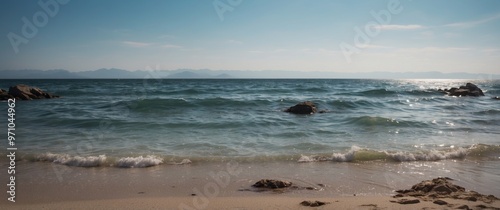 A peaceful ocean landscape with a clear view of the horizon. photo