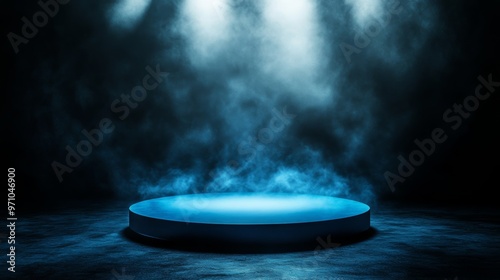 Illuminated Blue Circular Podium on Dark Background