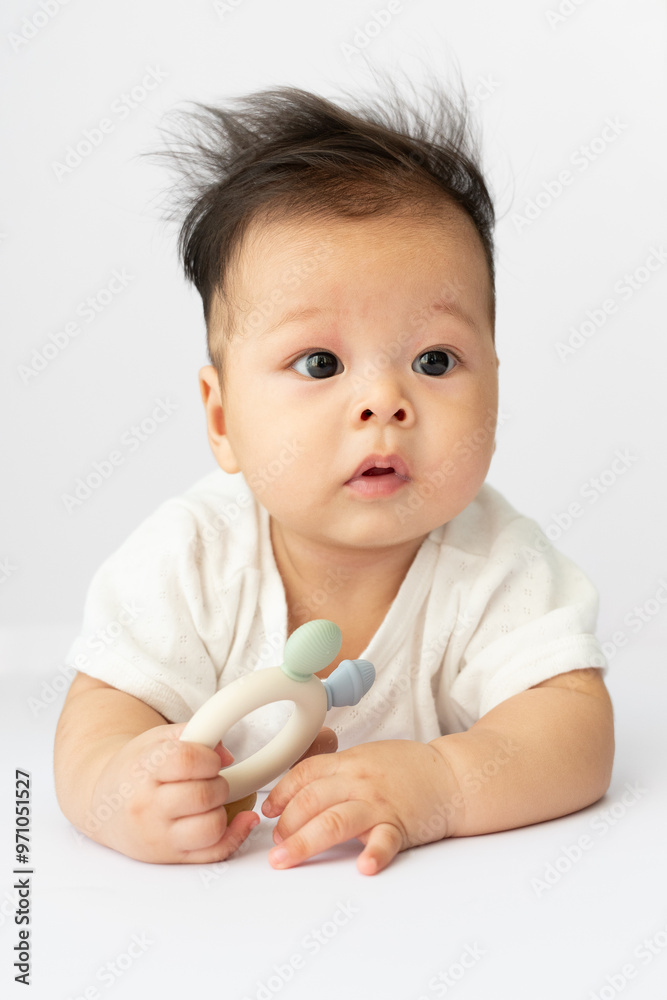 baby and mother interacting with each other, smiling baby, wrapped in a towel, with soft lighting baby and mother interacting with each other, smiling baby, wrapped in a towel, with soft lighting