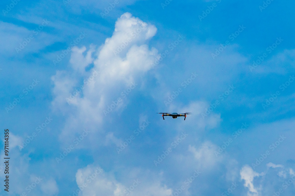 Flying and landing drone with blue sky in Mexico. Flying and landing drone with blue sky in Mexico.