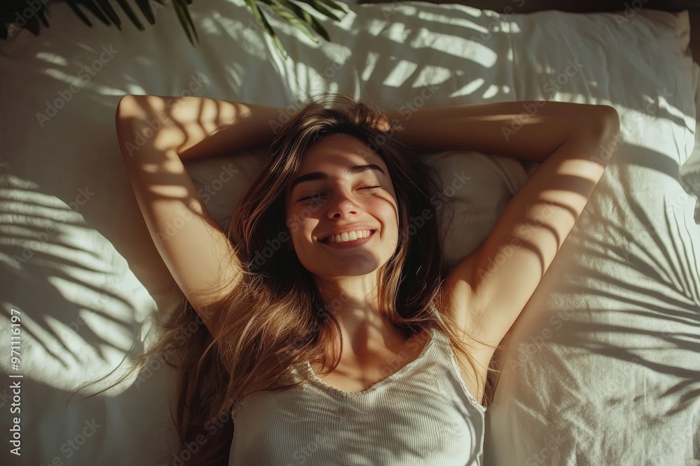 Fototapeta premium Woman resting peacefully on a bed with closed eyes