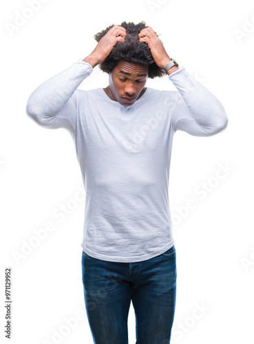 Fotografie Afro american man over isolated background suffering from headache desperate and stressed because pain and migraine