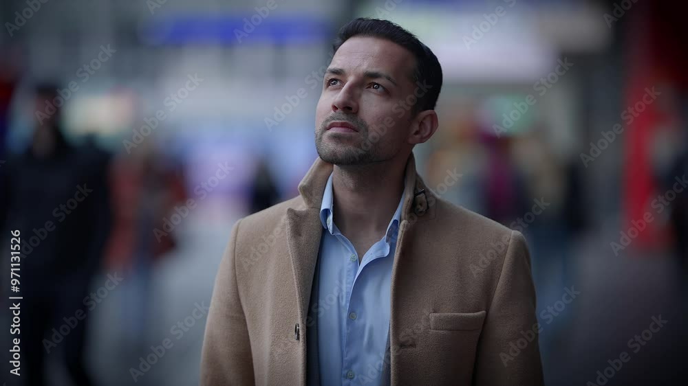 A Pensive Man in an Urban Setting with a Deeply Contemplative Expression on His Face A Pensive Man in an Urban Setting with a Deeply Contemplative Expression on His Face