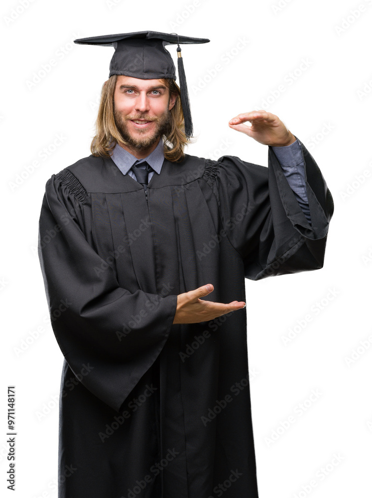 Young handsome graduated man with long hair over isolated background gesturing with hands showing big and large size sign, measure symbol. Smiling looking at the camera. Measuring concept. Young handsome graduated man with long hair over isolated background gesturing with hands showing big and large size sign, measure symbol. Smiling looking at the camera. Measuring concept.