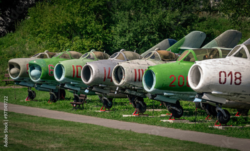 Old, military jet planes in line photo