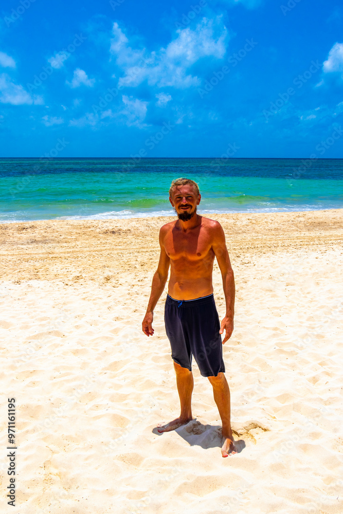Male tourist man with long hair on Caribbean beach Mexico. Male tourist man with long hair on Caribbean beach Mexico.