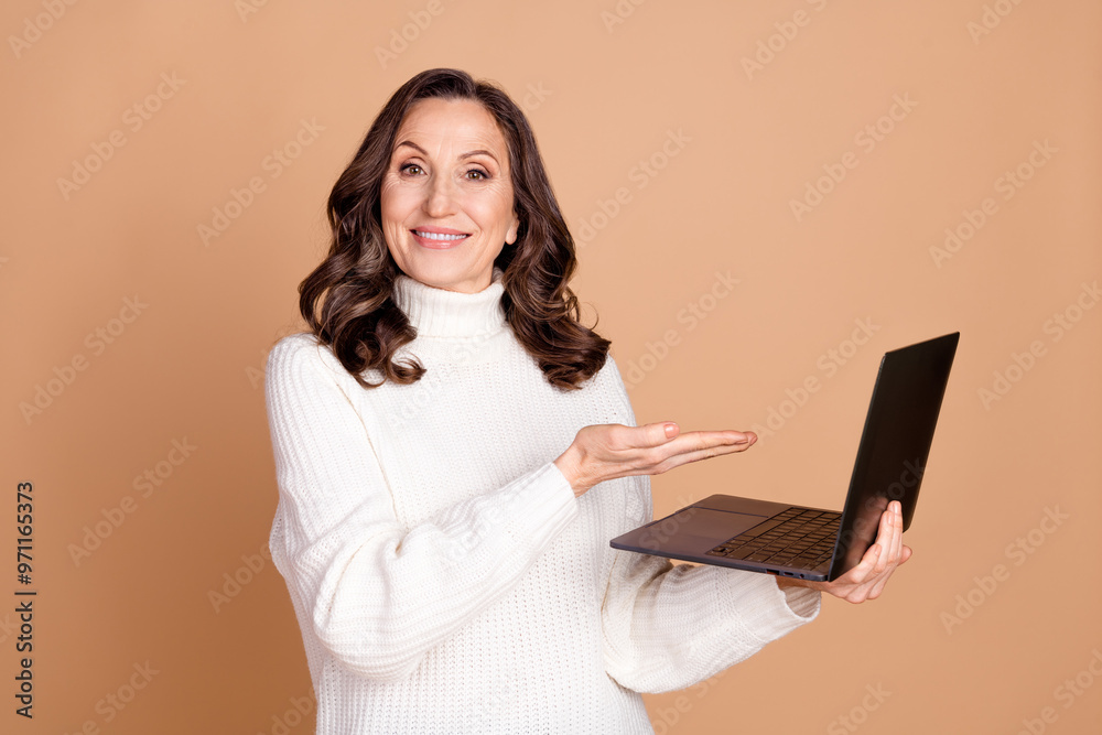 Photo of adorable lovely woman wear white stylish clothes recommend buy gadget isolated on beige color background Photo of adorable lovely woman wear white stylish clothes recommend buy gadget isolated on beige color background