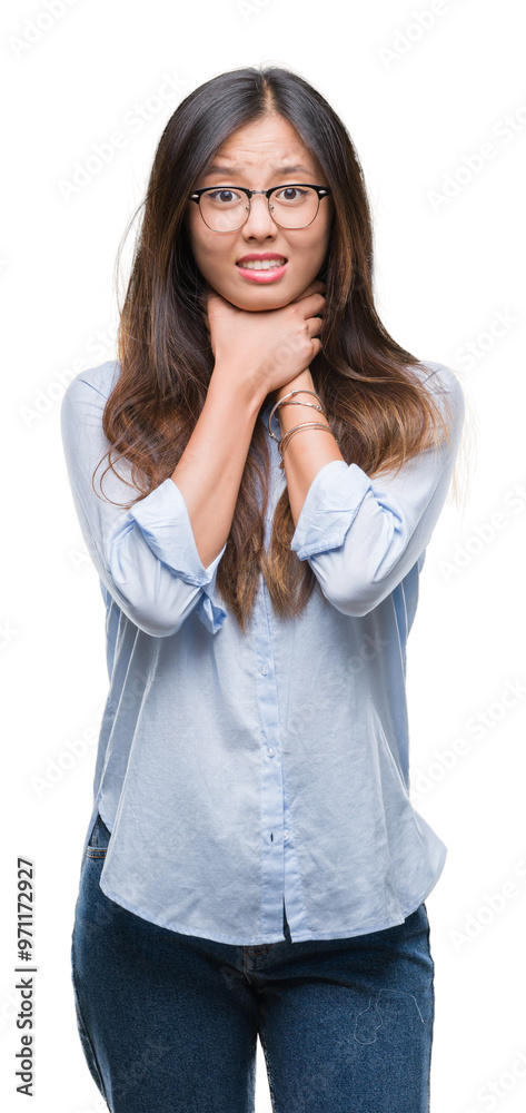 Young asian business woman wearing glasses over isolated background shouting and suffocate because painful strangle. Health problem. Asphyxiate and suicide concept. Young asian business woman wearing glasses over isolated background shouting and suffocate because painful strangle. Health problem. Asphyxiate and suicide concept.