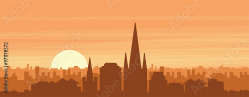 Brown panoramic poster of the city skyline with misty background buildings, sunrise, clouds and mountains of NORWICH, UNITED KINGDOM