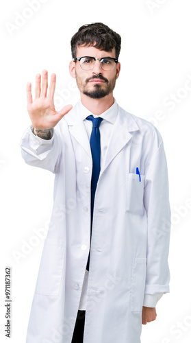 Young professional scientist man wearing white coat over isolated background doing stop sing with palm of the hand. Warning expression with negative and serious gesture on the face.