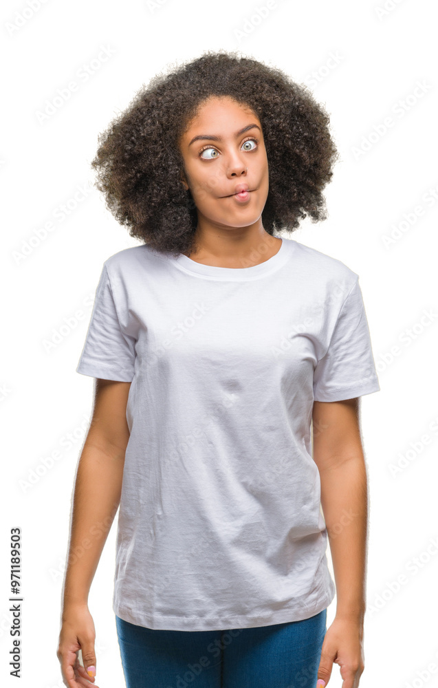 Young afro american woman over isolated background making fish face with lips, crazy and comical gesture. Funny expression. Young afro american woman over isolated background making fish face with lips, crazy and comical gesture. Funny expression.