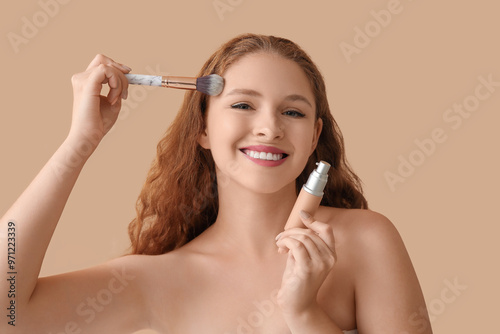Young redhead woman with ma...