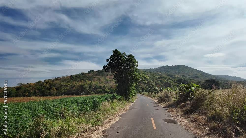 Driving on the road in rural, Lopburi, Thailand.
Driving on the road in rural, Lopburi, Thailand.