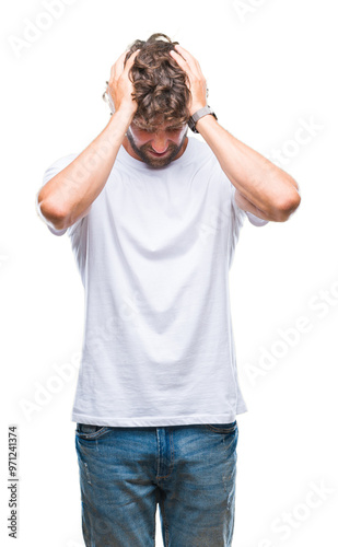 Fotografie Handsome hispanic model man over isolated background suffering from headache desperate and stressed because pain and migraine