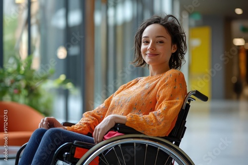 Championing Workplace Inclusivity An adept professional in a wheelchair highlights the strides made towards creating inclusive and accessible work environments,  photo