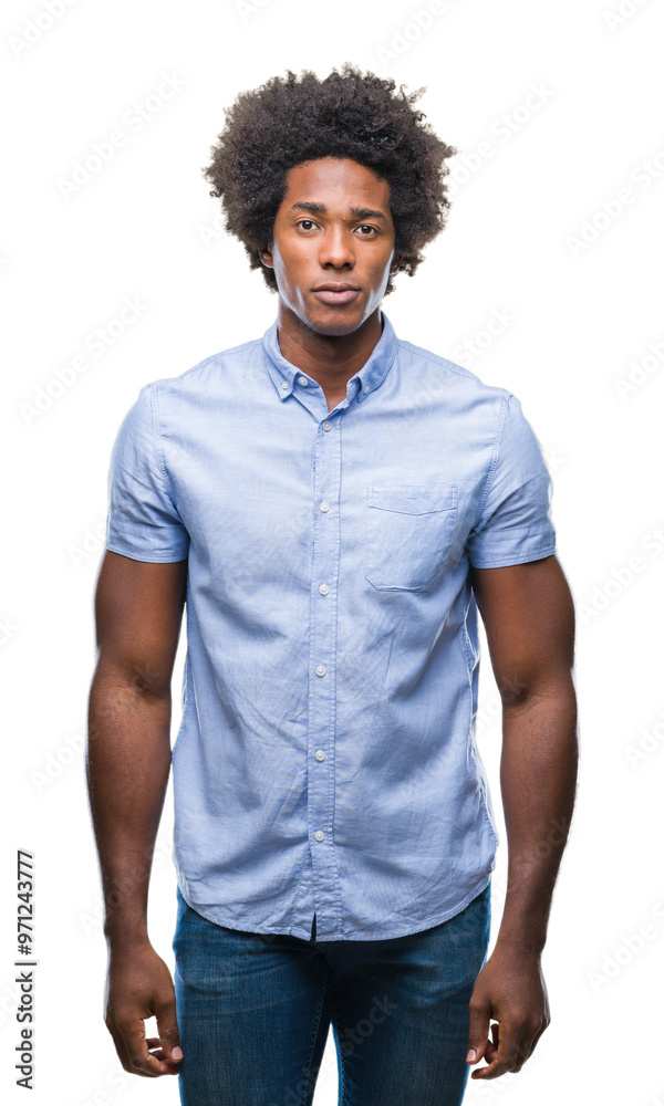 Afro american man over isolated background with serious expression on face. Simple and natural looking at the camera.