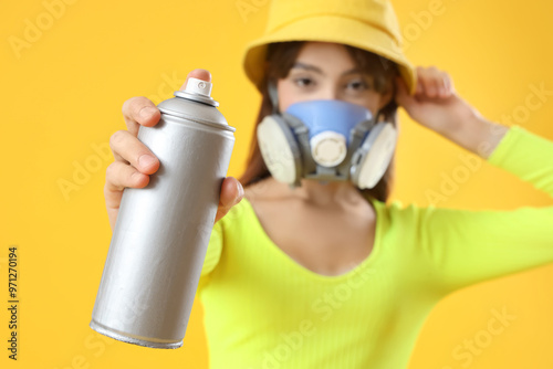 Young girl in respirator an...