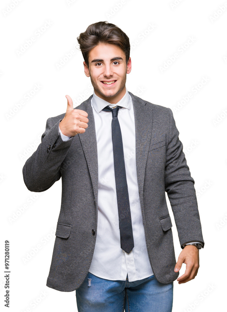 Young business man wearing suit and tie over isolated background doing happy thumbs up gesture with hand. Approving expression looking at the camera with showing success. Young business man wearing suit and tie over isolated background doing happy thumbs up gesture with hand. Approving expression looking at the camera with showing success.