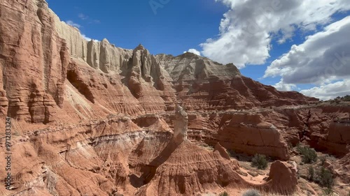 Stunning red rock formations and cliffs under a blue sky with clouds in Kodachrome Basin State Park, Utah. Scenic landscape view of the natural rock formations on a sunny day - USA photo