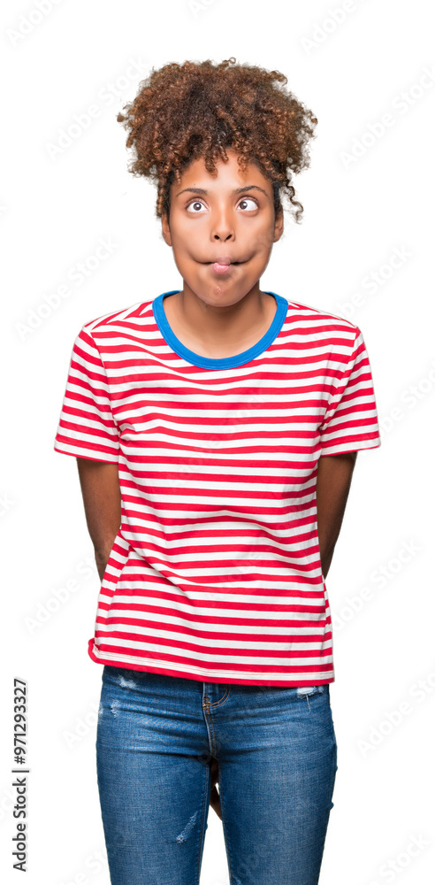 Beautiful young african american woman over isolated background making fish face with lips, crazy and comical gesture. Funny expression. Beautiful young african american woman over isolated background making fish face with lips, crazy and comical gesture. Funny expression.
