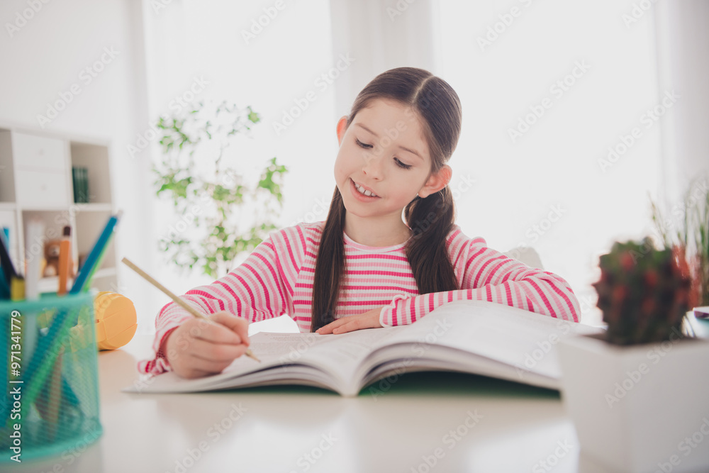 Photo portrait of young brunette schoogirl staying at home preparing for exam write notes into copbook sitting desk holidays isolated in her room Photo portrait of young brunette schoogirl staying at home preparing for exam write notes into copbook sitting desk holidays isolated in her room