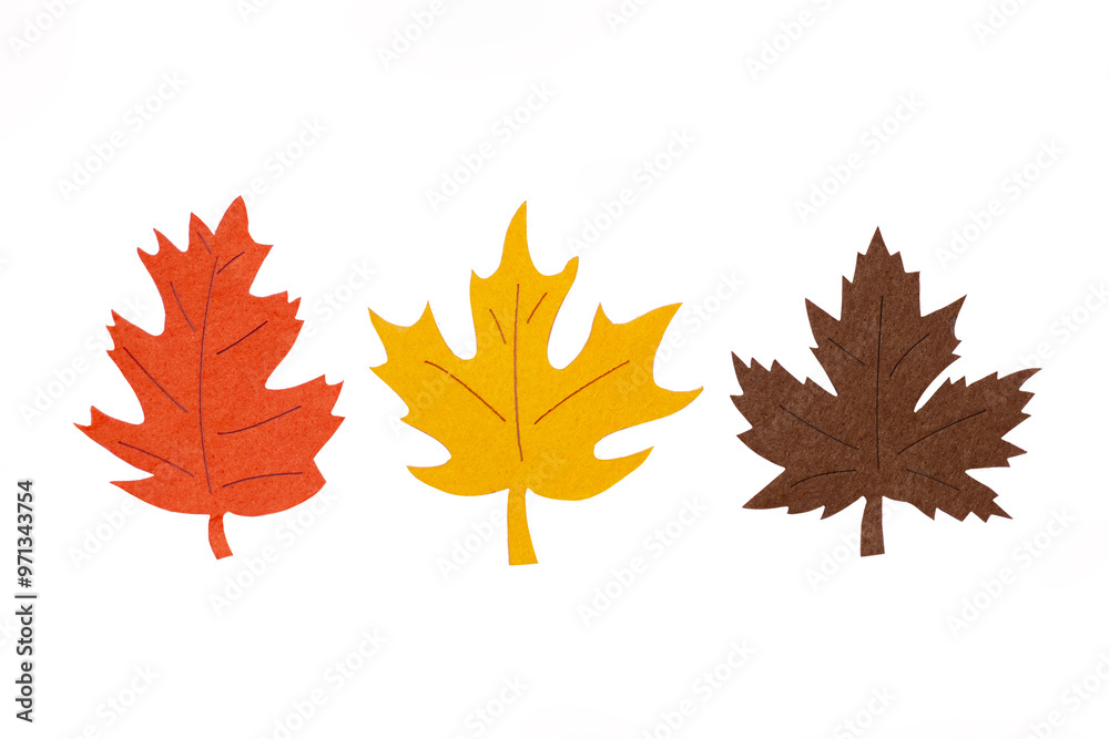 Fototapeta premium Hand-cut fabric autumn oak and maple leaves mockups, sample handmade, herbarium, logotype