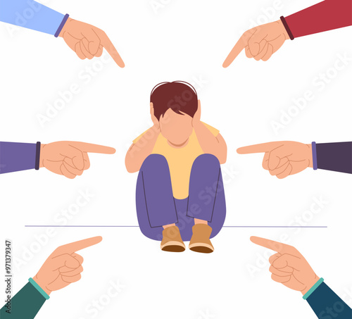 The boy is sitting with his ears covered in stress and hands with index fingers pointing at him.