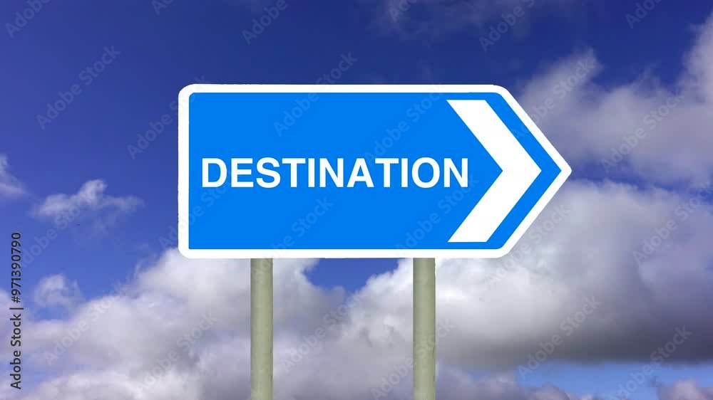 Zoom in to a simulated Destination sign indicating a destination with time lapse white clouds and a blue sky. Zoom in to a simulated Destination sign indicating a destination with time lapse white clouds and a blue sky.