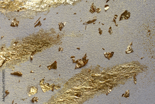 Glowing sparkles on beige watercolor background