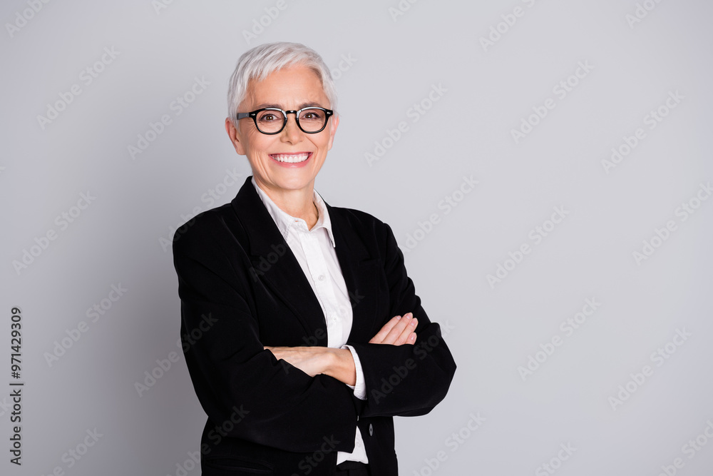 Photo of pretty senior female professional entrepreneur crossed hands toothy smile wear formalwear isolated on gray color background