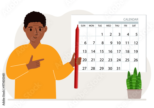 A man with a pencil in his hand creates a calendar. Planning and time management, responsible employee plans meetings and events.