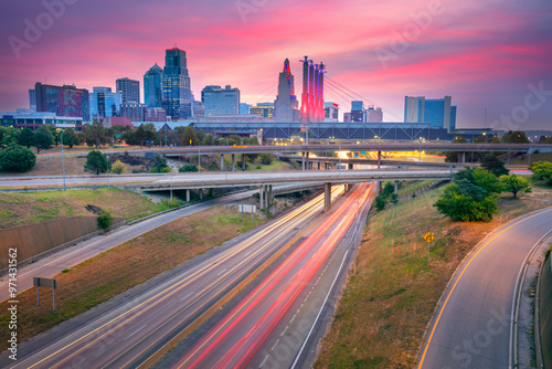 Kansas City, Missouri, USA. Cityscape image of Kansas City skyline with busy highway leading to the city at autumn sunrise. photo