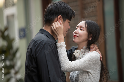 Asian young couple looking each other and spending time together