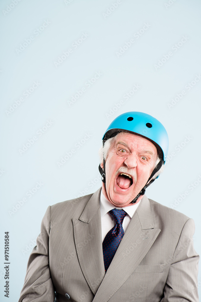 Shout, portrait and businessman with helmet in studio with mockup space to commute to work. Crazy, scream and senior male corporate employee with safety equipment for travel by white background. Shout, portrait and businessman with helmet in studio with mockup space to commute to work. Crazy, scream and senior male corporate employee with safety equipment for travel by white background.