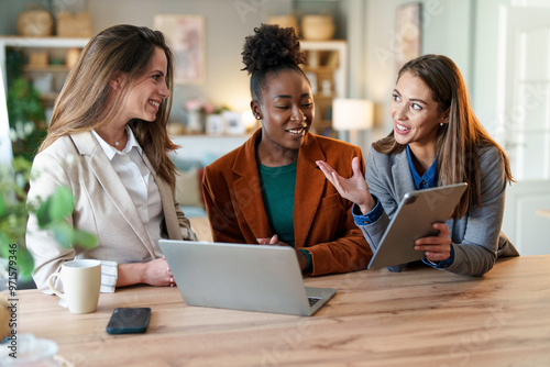 Diverse Team of Professional Women Engaging in a Collaborative Effort