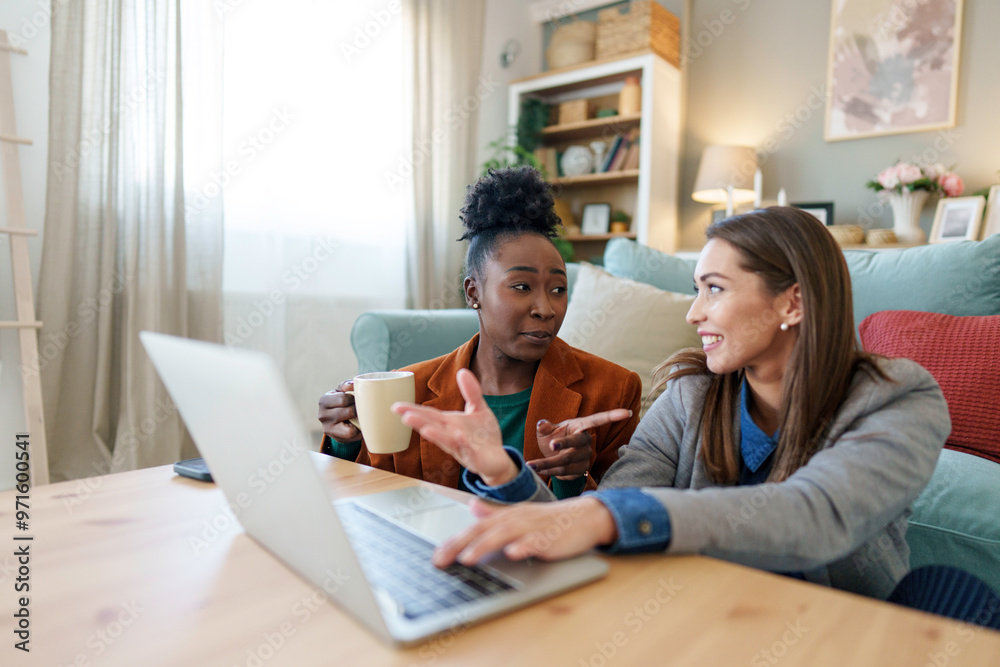 Diverse Entrepreneurs Planning Strategy in Home Office Diverse Entrepreneurs Planning Strategy in Home Office
