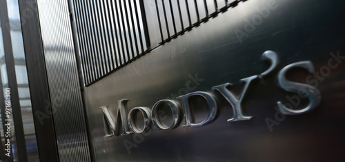 Metal logo emblem of financial credit rating agency Moody's Moodys. Concept of finance economy money currency banking business inflation wealth economic crisis investment savings