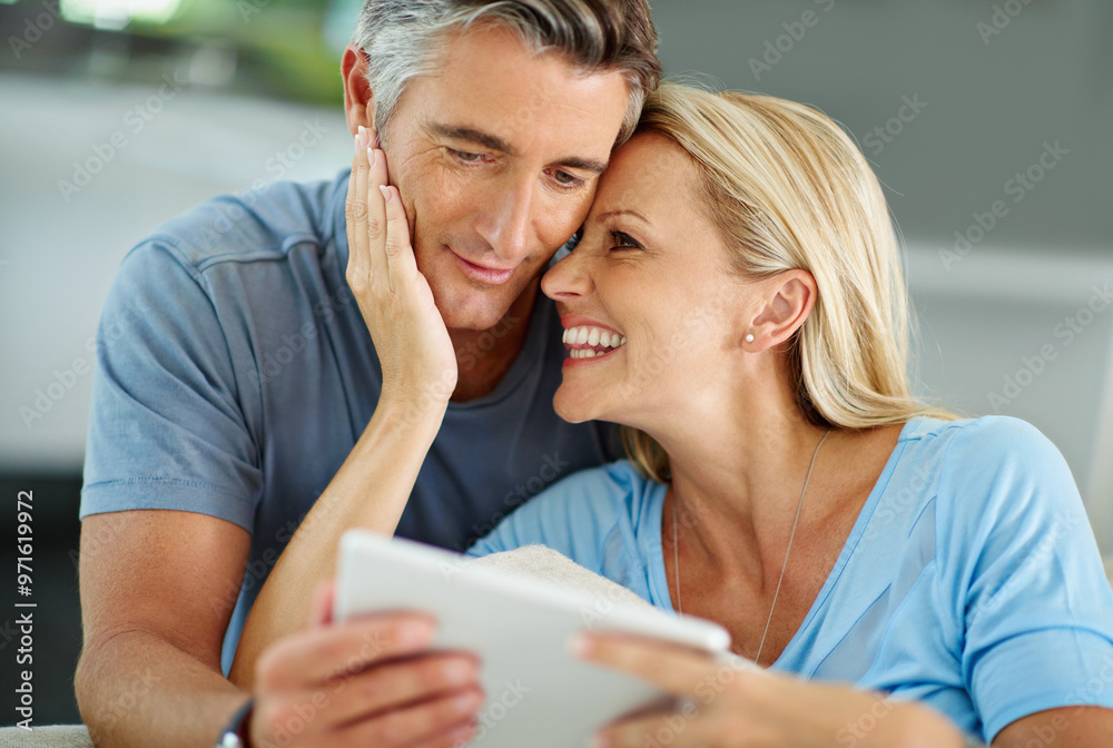 House, watch and couple with tablet, love and smile for bonding, romance and subscription for entertainment. Home, man and woman with app, streaming and movies in living room, break and affection House, watch and couple with tablet, love and smile for bonding, romance and subscription for entertainment. Home, man and woman with app, streaming and movies in living room, break and affection