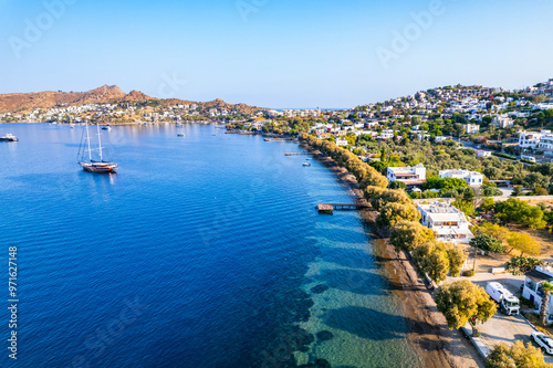 Fototapeta Naklejka Na Ścianę i Meble -  Yalikavak Bay of Bodrum. Mugla, Turkey. Panoramic view of Yalikavak marina and beach. Drone shot.