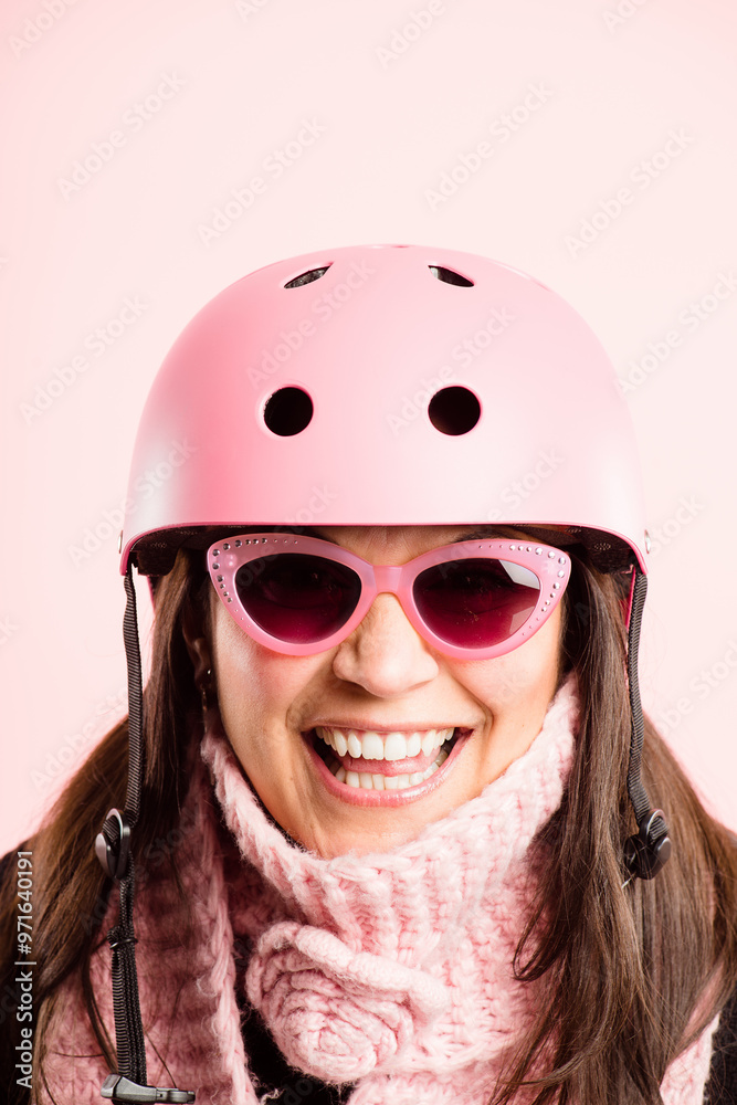 Helmet, portrait and sunglasses with woman in studio isolated on pink background for cycling. Eyewear, face and safety with smile of happy person on mockup space, excited for fashion or fitness Helmet, portrait and sunglasses with woman in studio isolated on pink background for cycling. Eyewear, face and safety with smile of happy person on mockup space, excited for fashion or fitness