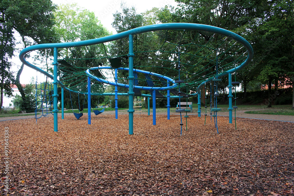 The equipment for the children's play area is blue. The equipment for the children's play area is blue.