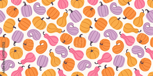 Seamless autumn pattern with pastel pumpkins and gourds in orange, purple, pink, and yellow colors. Thanksgiving Day. Harvest backdrop. Background for fall seasonal decorations, and cozy home decor.