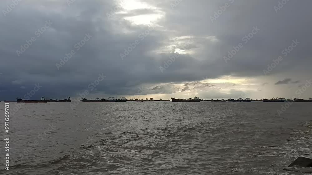Powerful stormy sea waves in top-down drone shot perspective. Sea Beach at Chittagong in Bangladesh. Powerful stormy sea waves in top-down drone shot perspective. Sea Beach at Chittagong in Bangladesh.