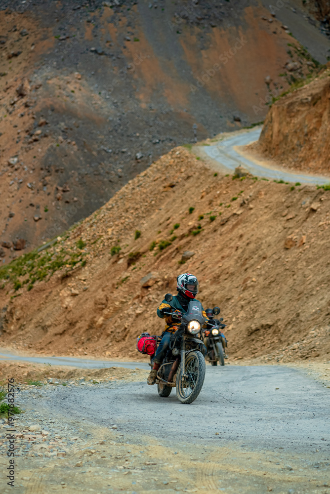 solo bike rider in mountains, solo bike traveller in spiti valley solo bike rider in mountains, solo bike traveller in spiti valley