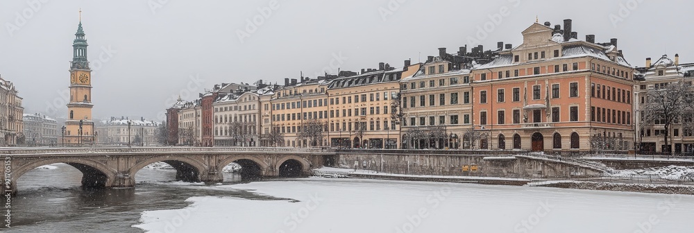 Naklejka premium Winter Cityscape Snow Covered Historic Buildings, Bridges, And A Frozen River In Stockholm, Sweden