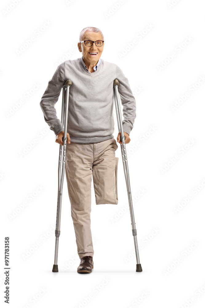 Elderly man with amputated leg standing with crutches Elderly man with amputated leg standing with crutches