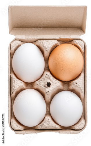 A carton of four eggs, featuring one brown egg and three white eggs, perfect for food photography and culinary themes. photo