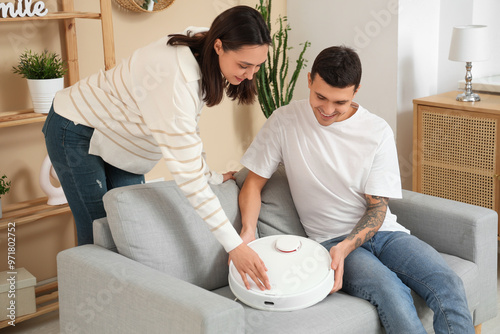 Young couple with modern ro...