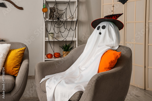 Ghost on armchair in living...