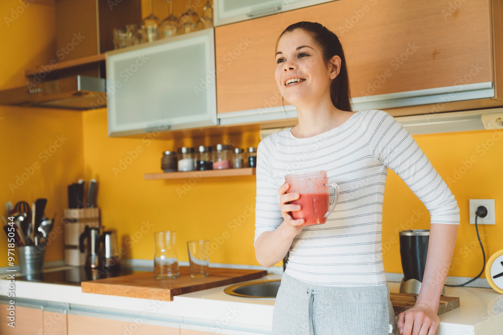 Happy caucasian woman drinking her smoothie, living a healthy lifestyle Happy caucasian woman drinking her smoothie, living a healthy lifestyle